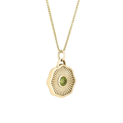 Solid 14k gold necklace with a green gemstone pendant on a white background
