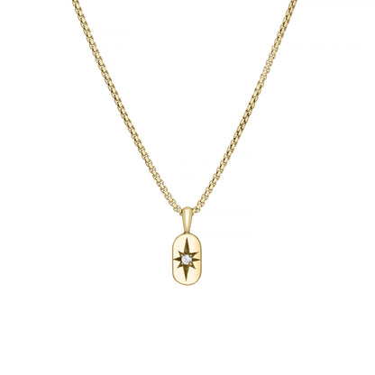 Solid 14k gold pendant with a star-set gemstone on a gold chain with a white background